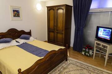 Фото номера Two-Bedroom Apartment- semi-basement Апарт-отели Villa Casafina Serviced Apartments г. Мангалия 5