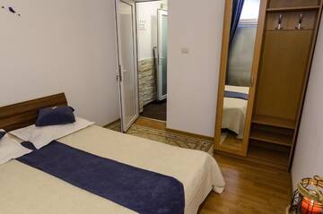 Фото номера Two-Bedroom Apartment- semi-basement Апарт-отели Villa Casafina Serviced Apartments г. Мангалия 11